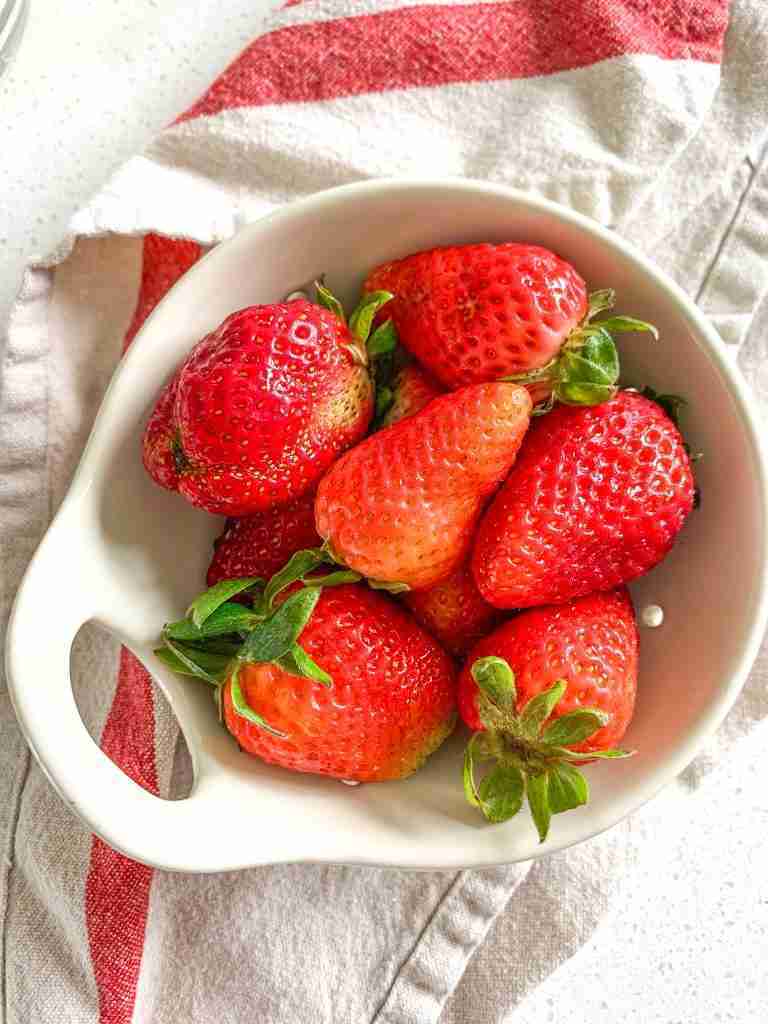 washed strawberries for Homemade Strawberry Glaze (for Angel Food Cake)