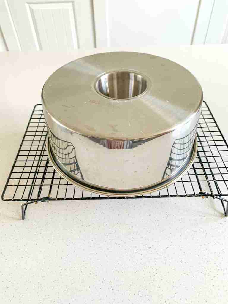 sourdough angel food cake cooling upside down