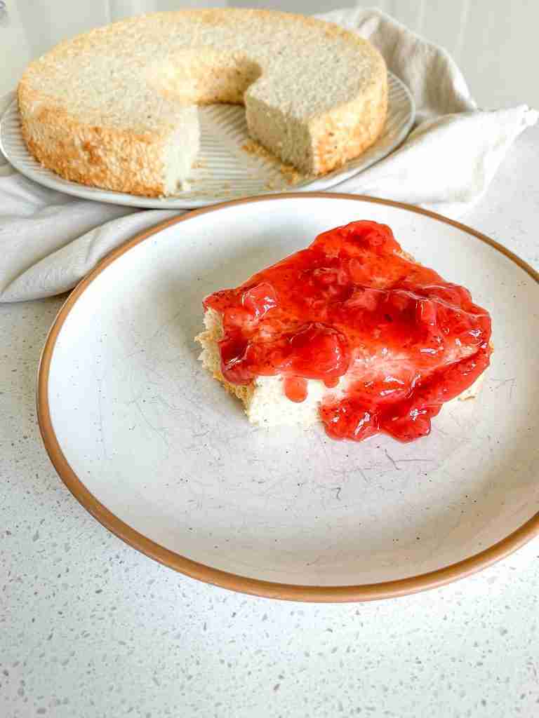 Homemade Strawberry Glaze put over angel food cake