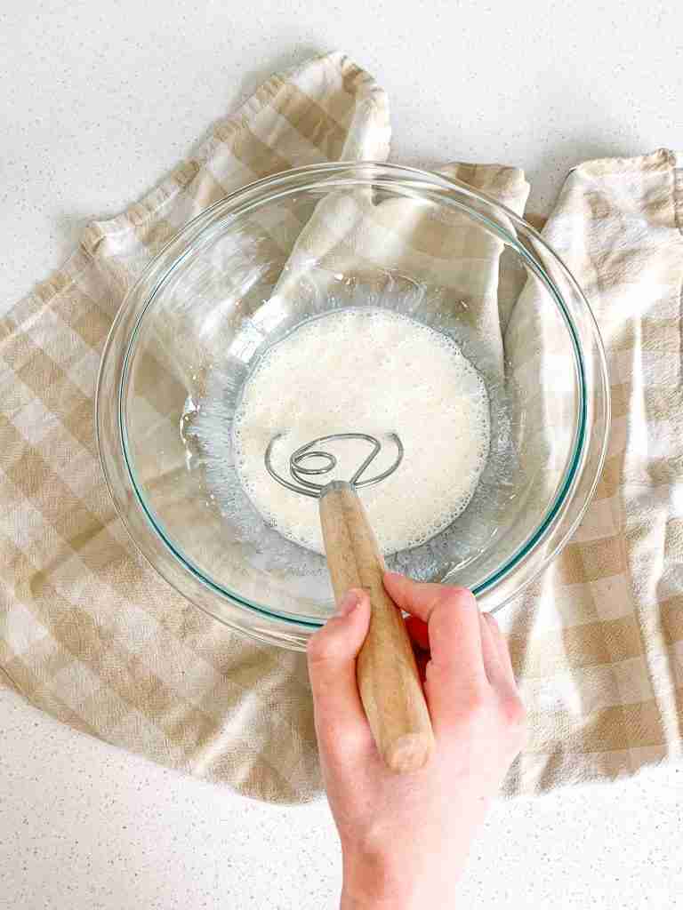 mixing wet ingredients for sourdough brioche buns