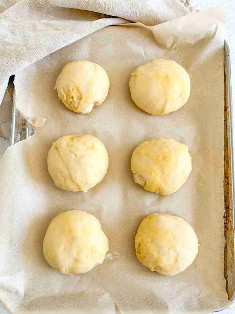 sourdough brioche buns proofed and ready to bake