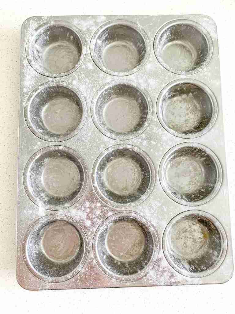 greased muffin tin 