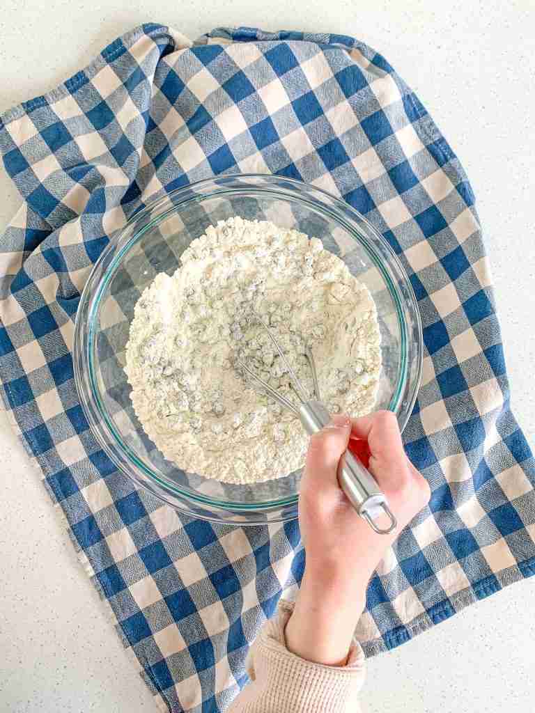 adding in blueberries