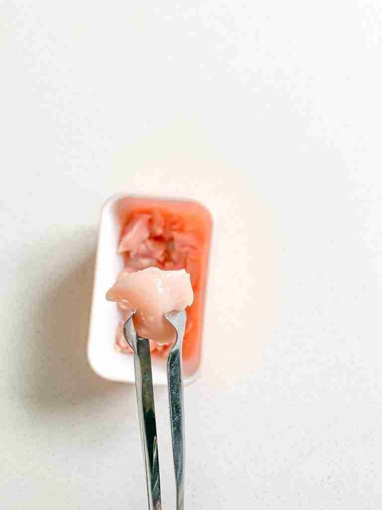 cutting chicken breast into bite size pieces