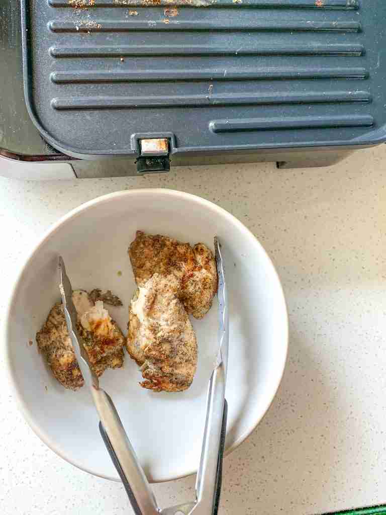 chicken removed from the grill and resting