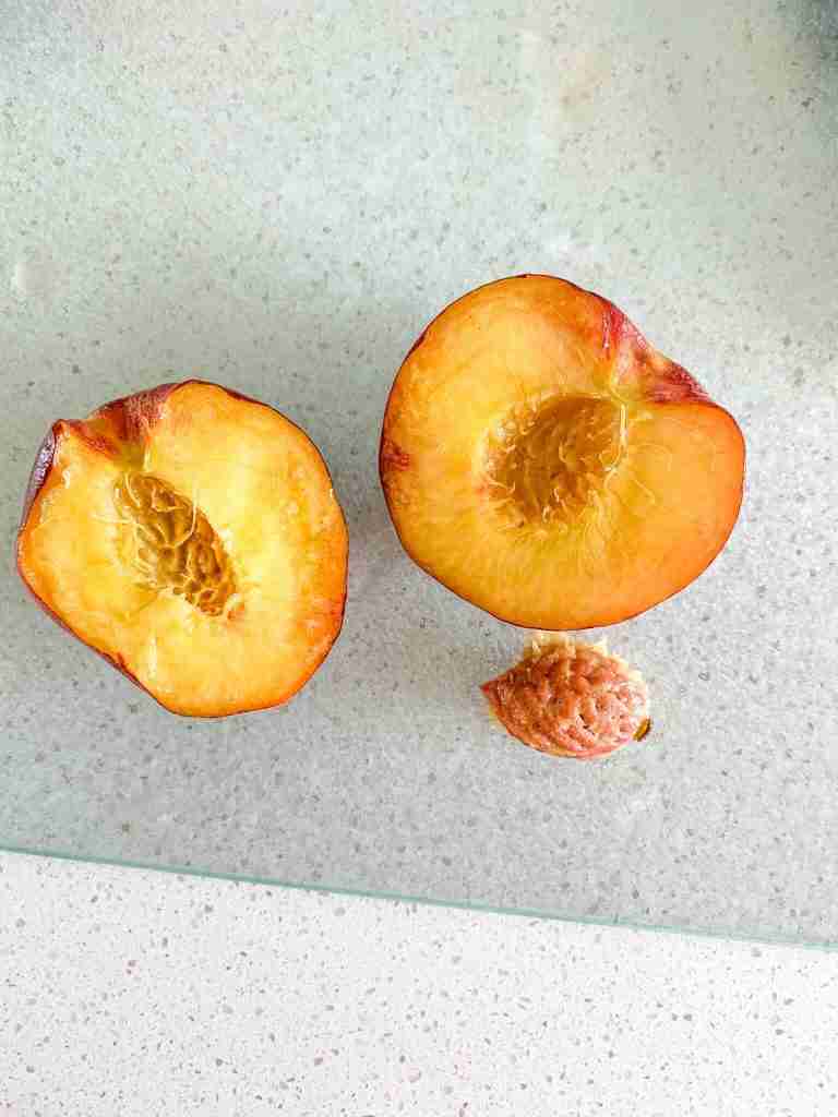 peach cut in half and seed removed