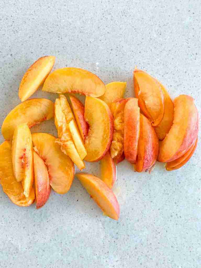 peaches sliced for the top of the tart