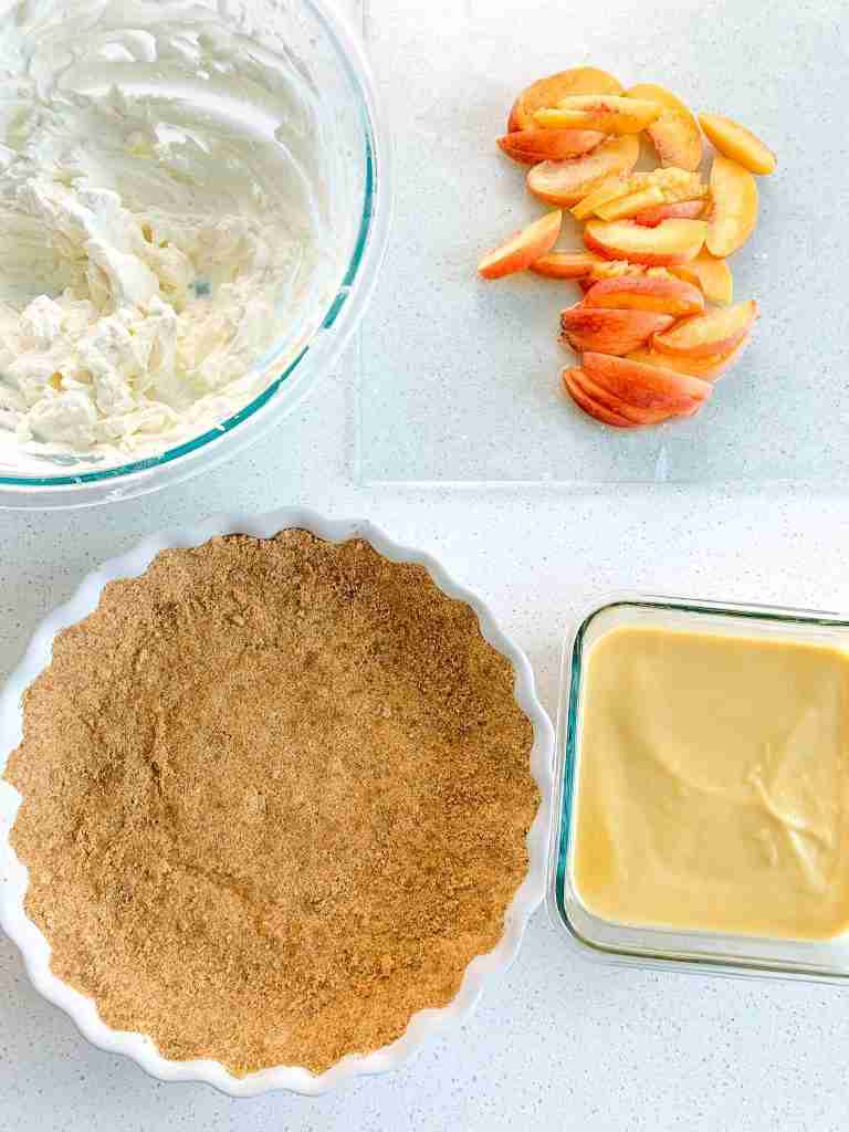 all ingredients laid out to assemble the icebox peach tart