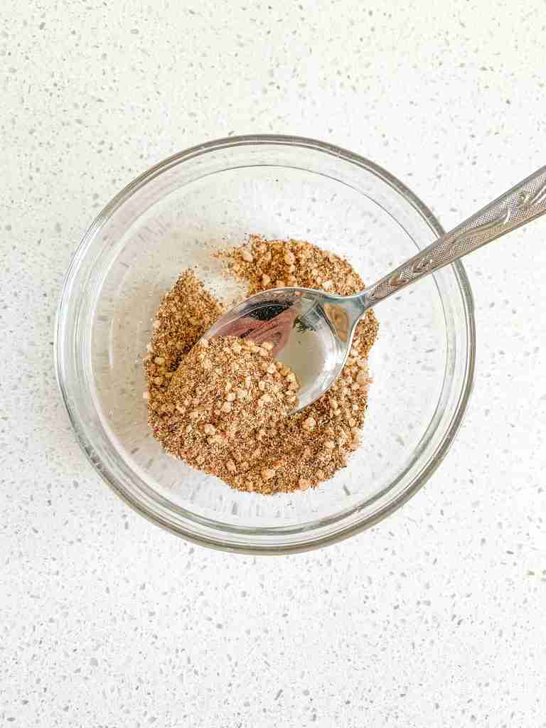 mixing homemade taco seasoning