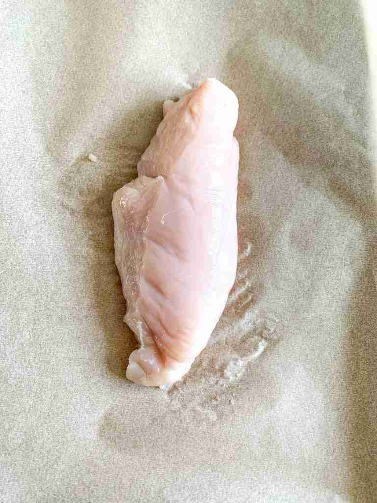 chicken breast on a sheet pan