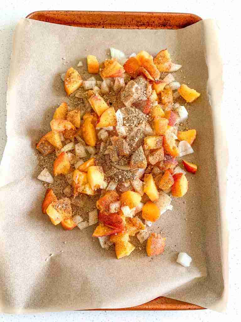 seasoning added to sheet pan and ready to bake