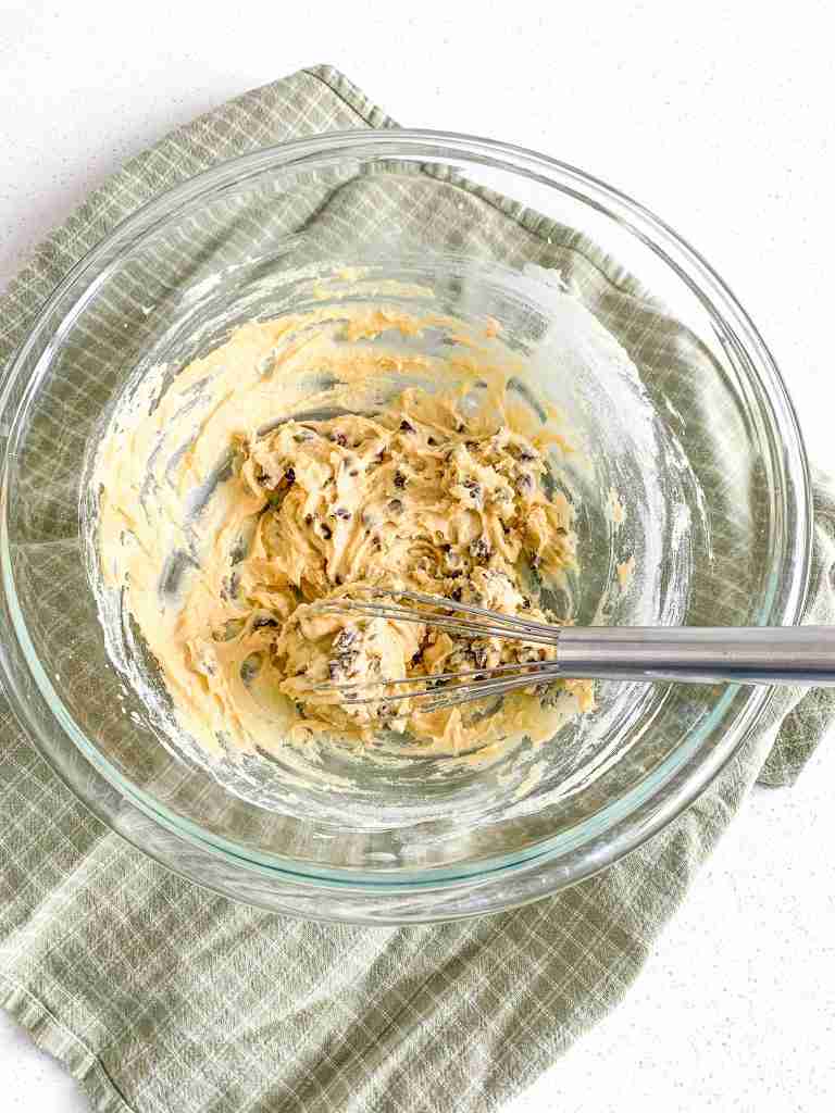 sourdough blondie dough whisked in a bowl