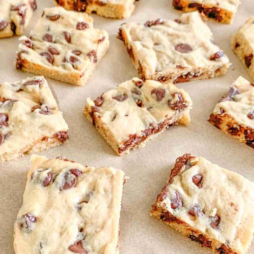 sourdough chocolate chip blondies squares on parchment
