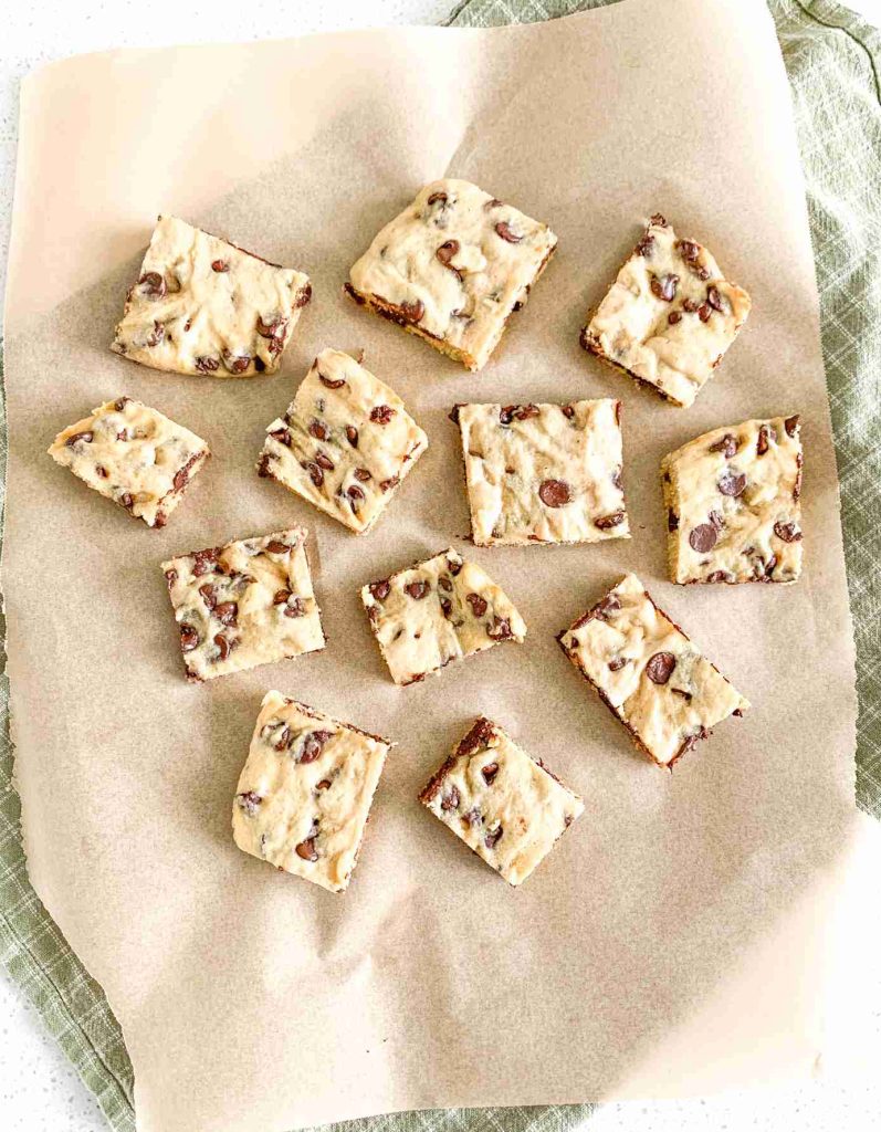 sourdough chocolate chip blondies squares on parchment