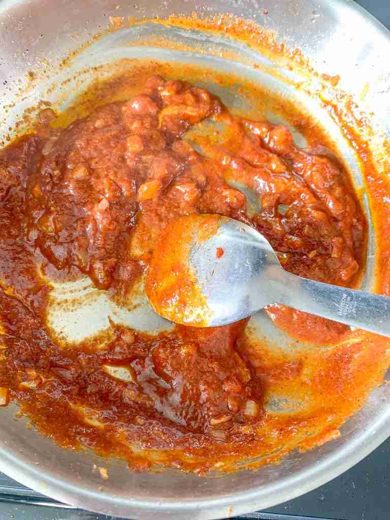 mixing ingredients for coney sauce