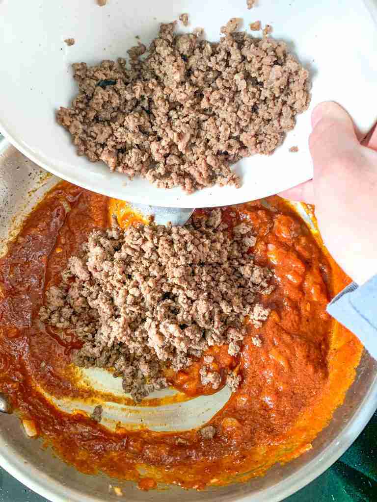 adding cooked beef back into the coney sauce