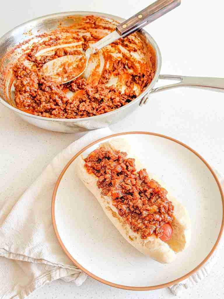 homemade coney dogs with coney dog sauce in a pan