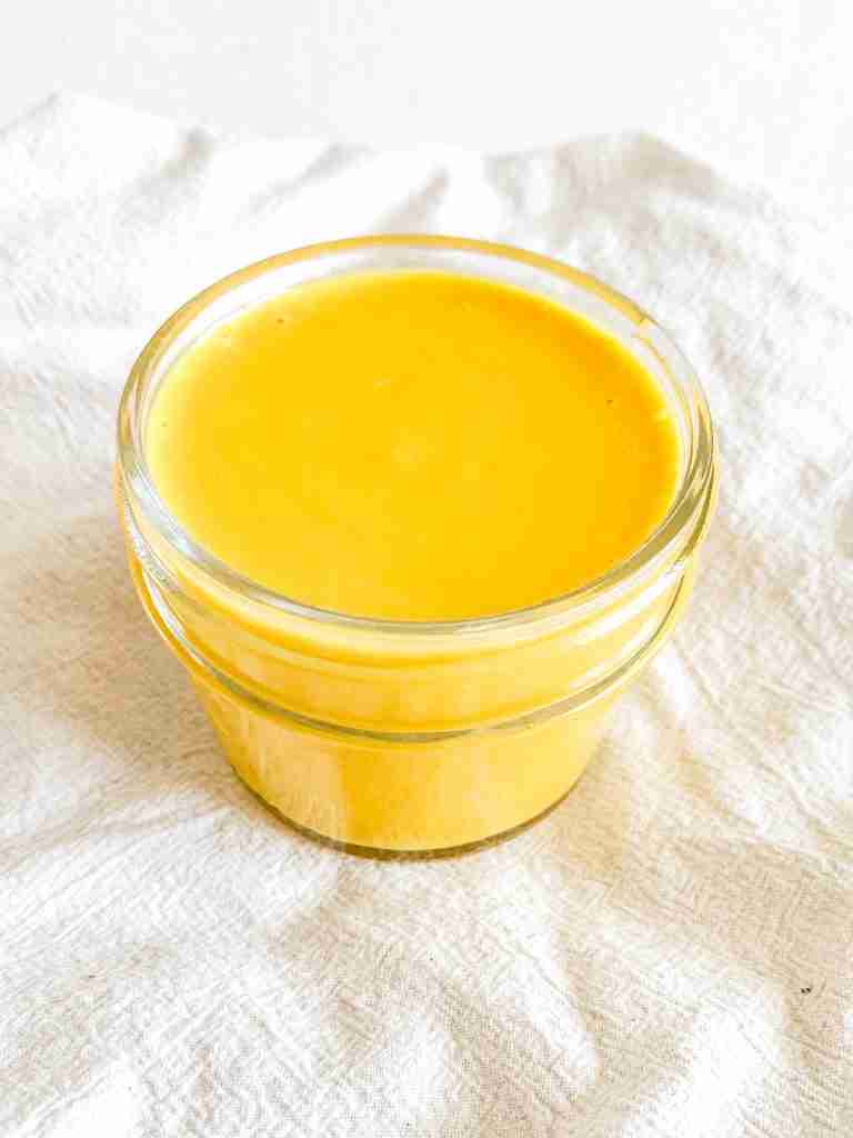 freshly made homemade honey mustard in a small jar