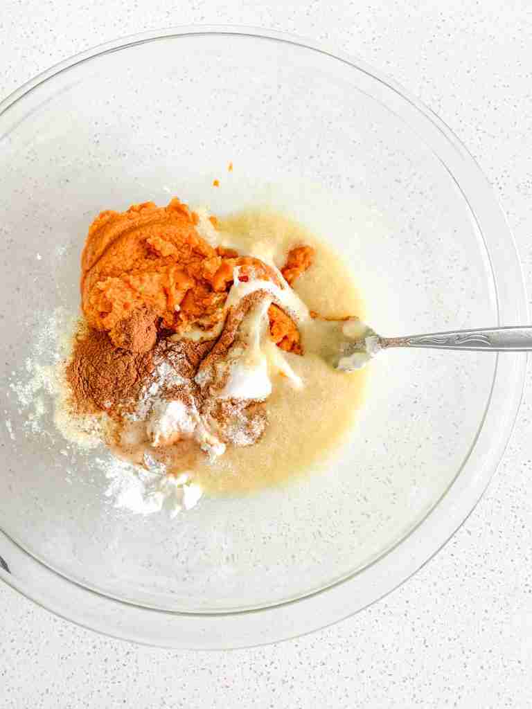 wet ingredients for cookies getting mixed with a fork