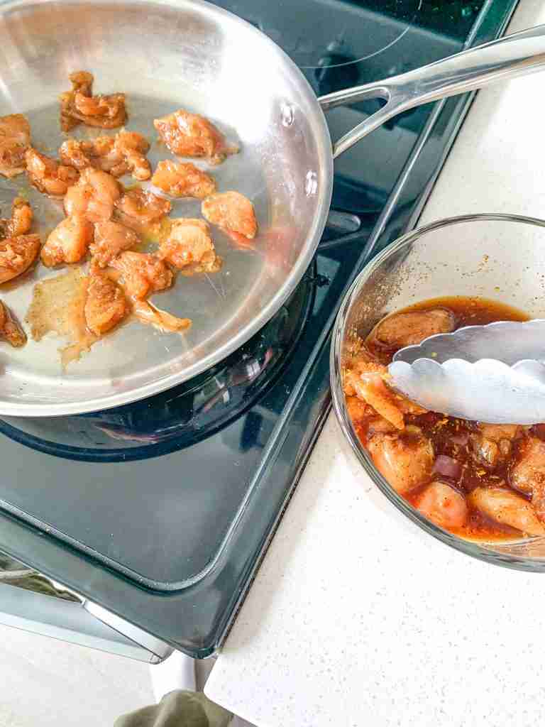 cooking chicken in a skillet