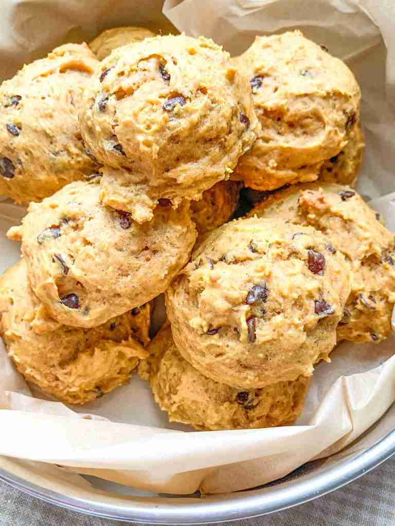 freshly baked mini sourdough chocolate chip pumpkin cookies in a tin
