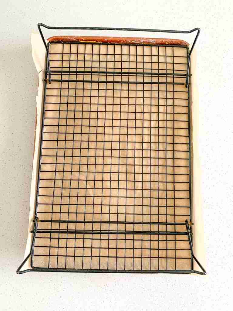 cooling rack on top of cake pan