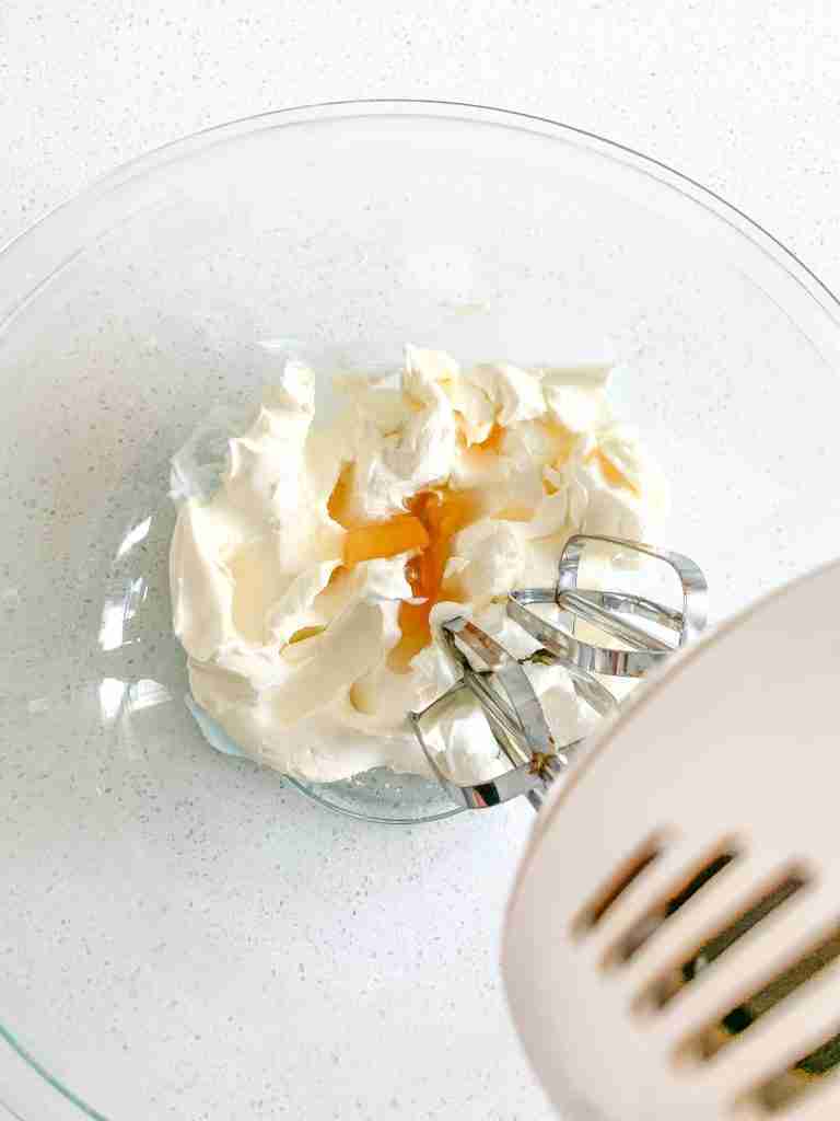 mixing cream cheese frosting