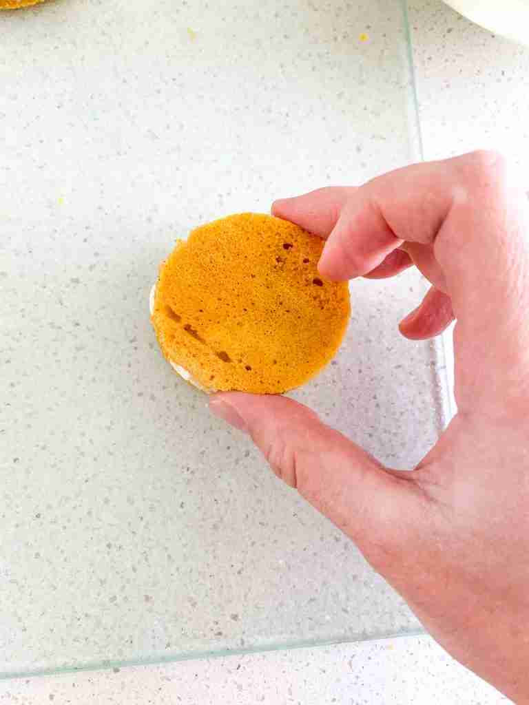 stacking cake bites and frosting