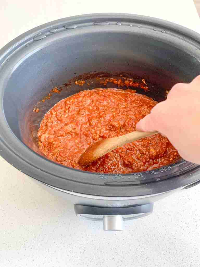 stirring cooked walking taco meat