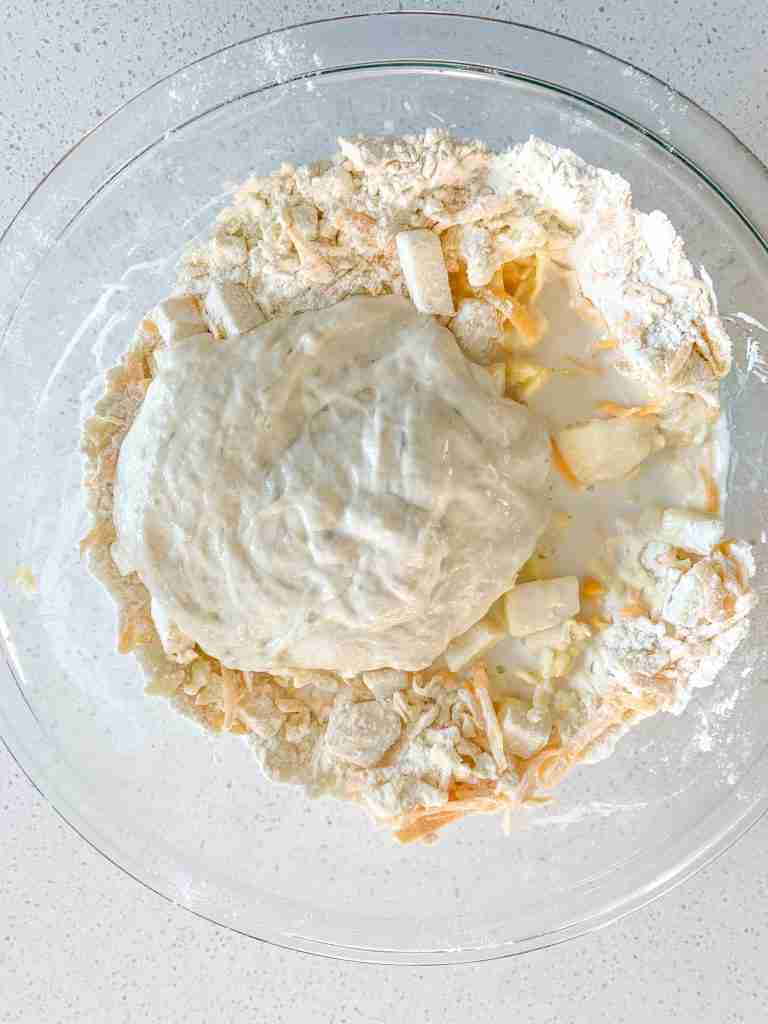 adding wet ingredients into scone mixture