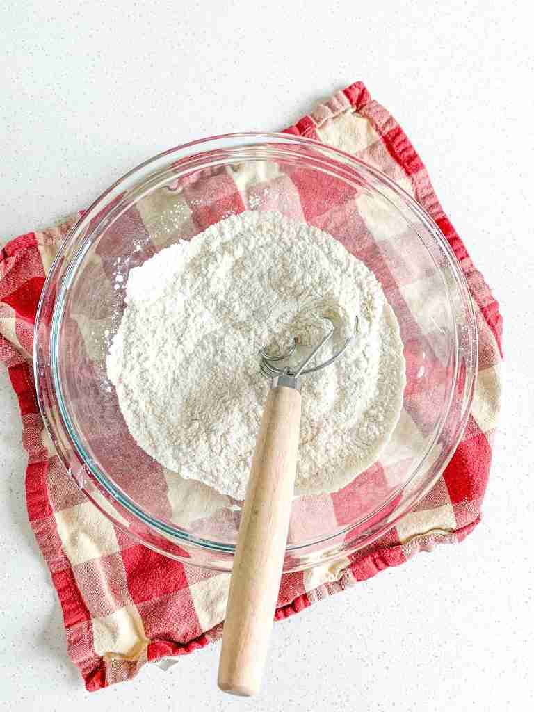 mixing dry ingredients for sourdough puff pastry