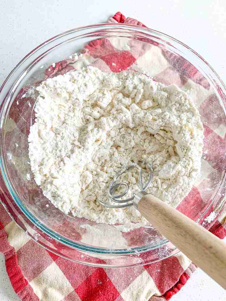 mixing butter into turnover puff pastry dough