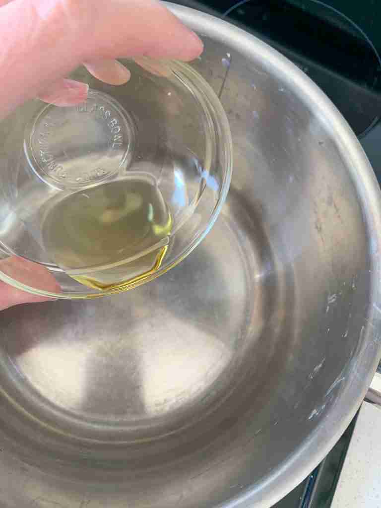 adding avocado into a pan