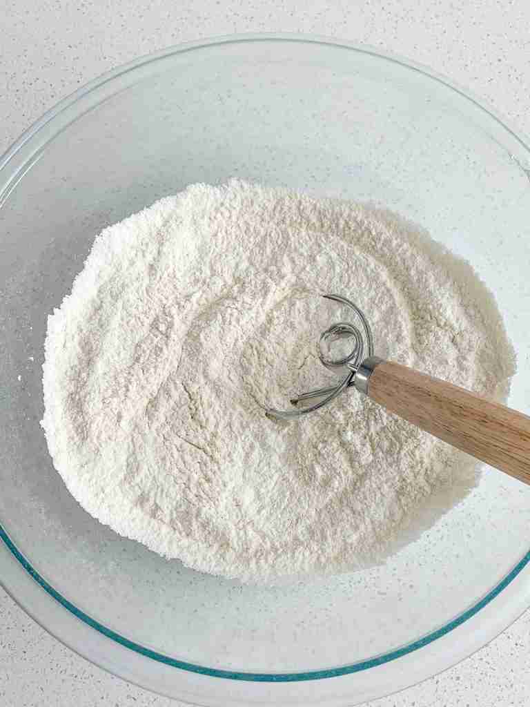 combining dry ingredients for biscuits