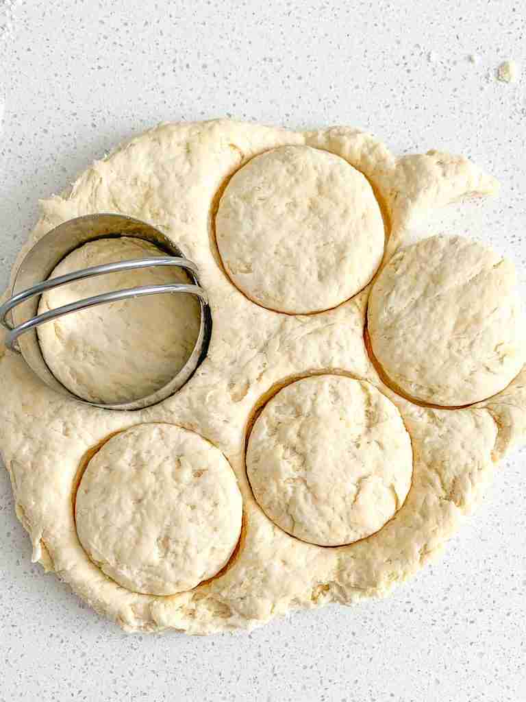 cutting biscuits out with a biscuit cutter