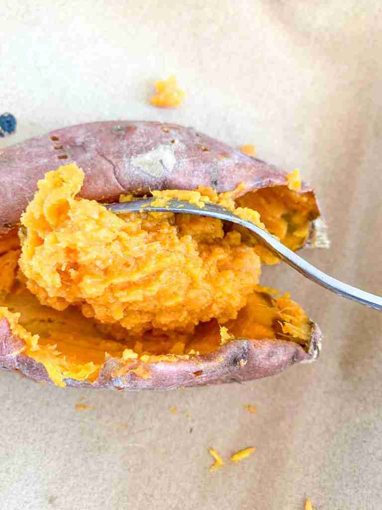 adding mashed sweet potatoes back into skins