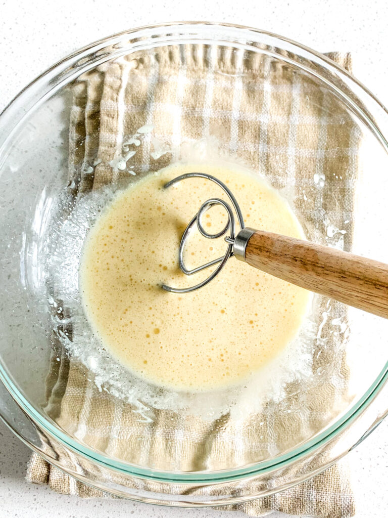 mixing wet ingredients for hawaiian rolls