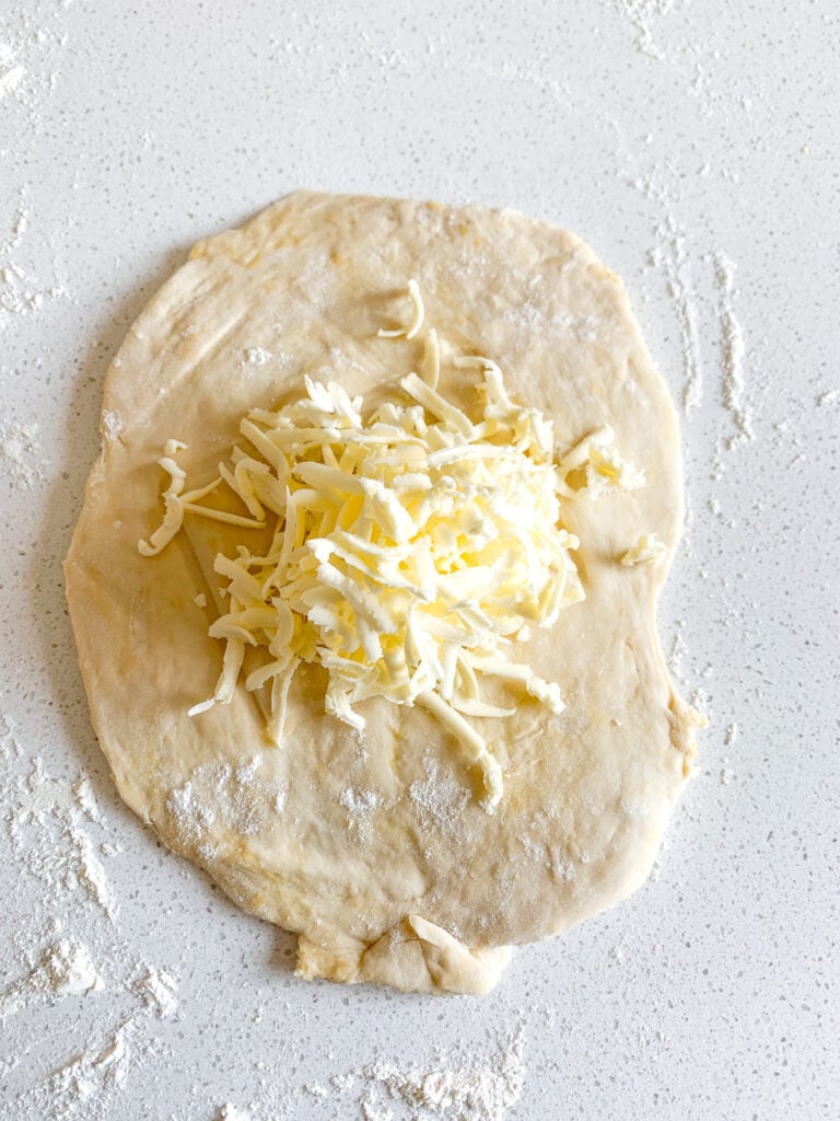 grated butter on danish dough for laminating