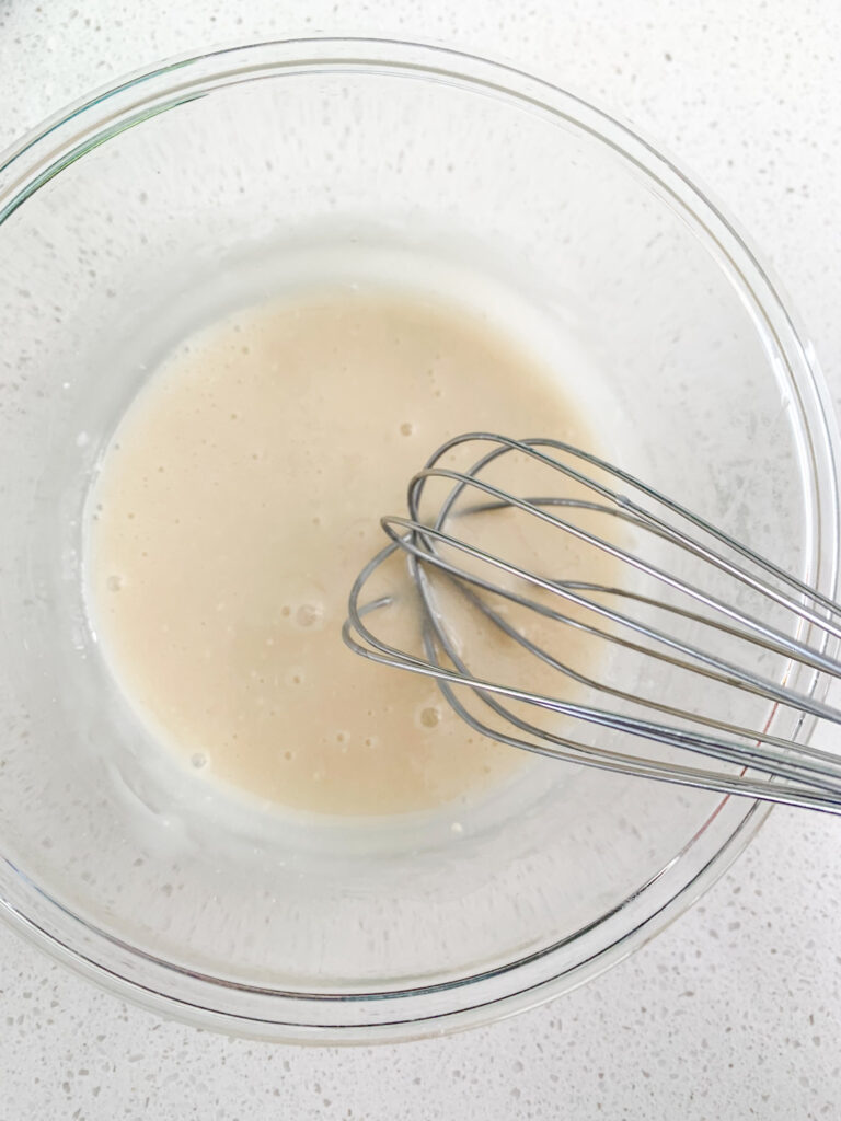 whisking glaze ingredients together