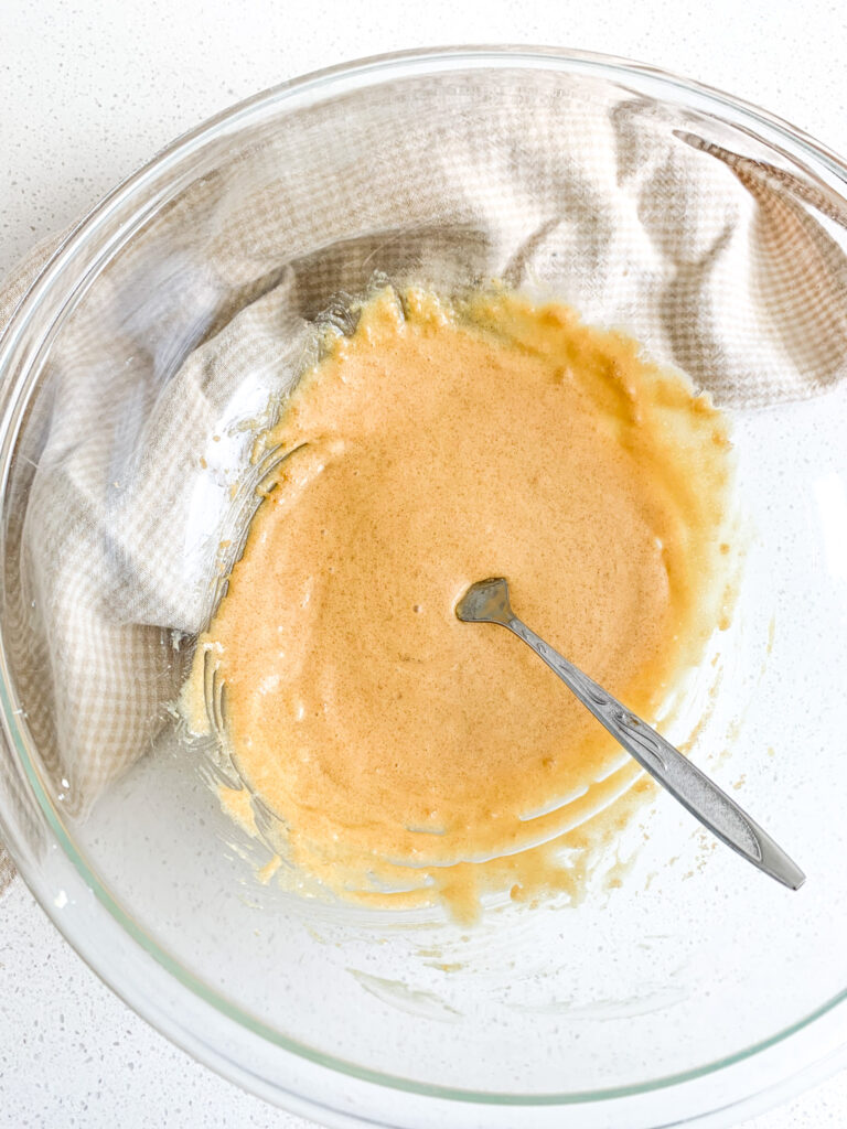 egg mixed into butter and sugar for cookies