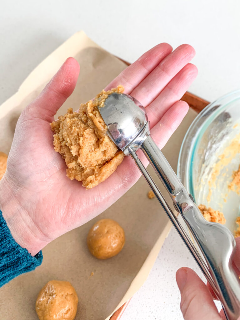 scooping peanut butter cookie dough