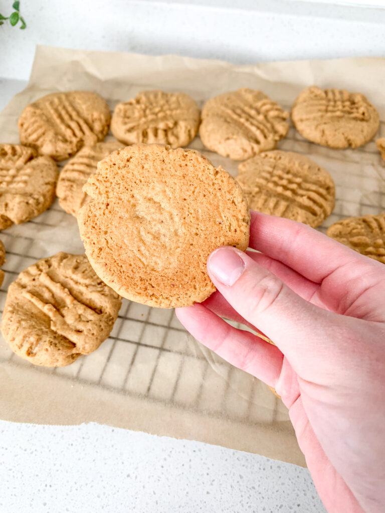 the bottoms of freshly baked sourdough peanut butter cookies