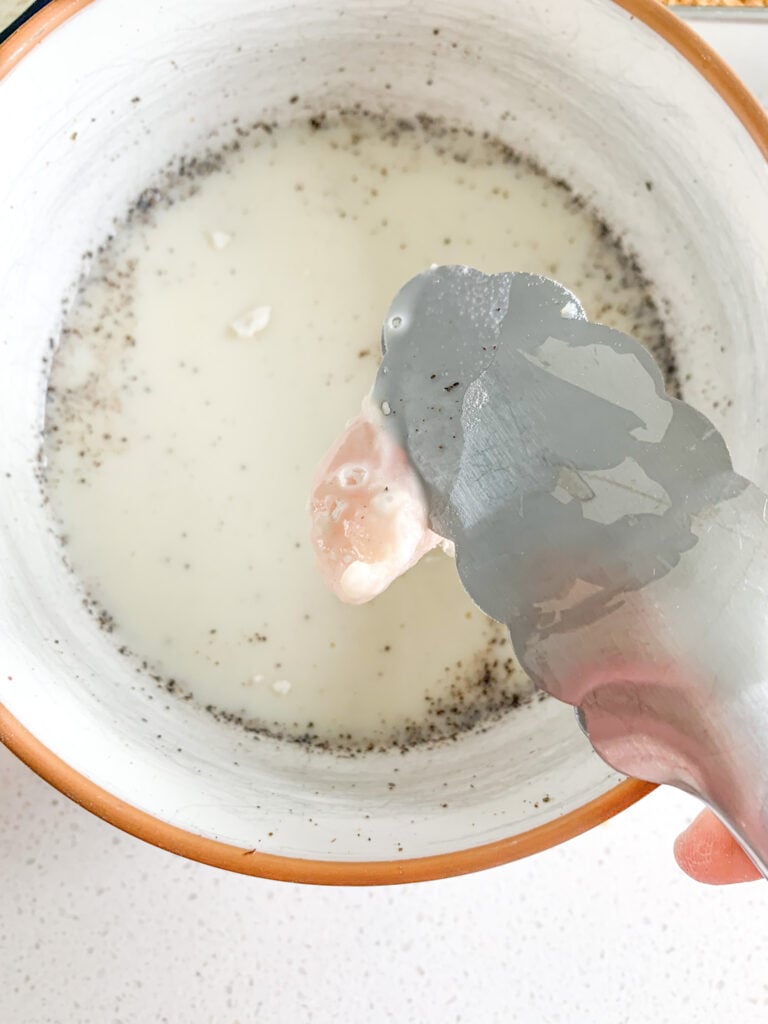 dipping chicken in milk for dredging