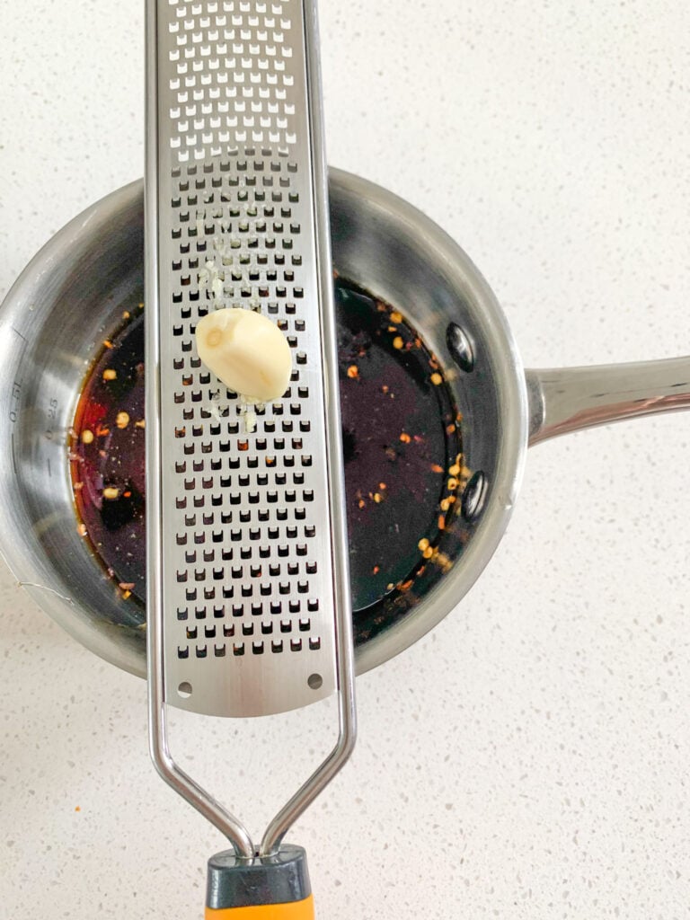 grating fresh garlic for sauce
