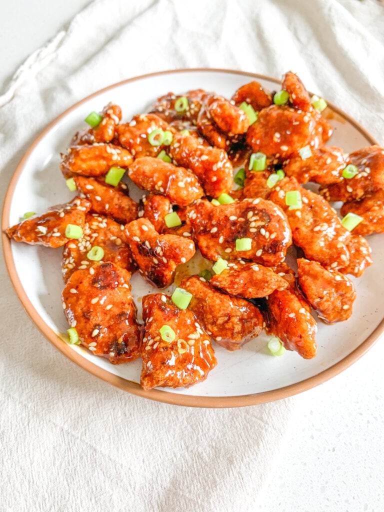 freshly cooked and tossed baked general tso's chicken