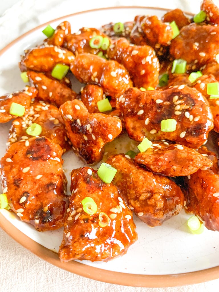 freshly cooked and tossed baked general tso's chicken