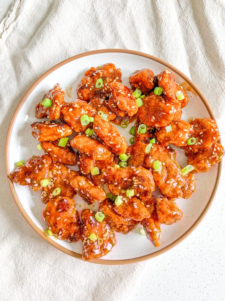 freshly cooked and tossed baked general tso's chicken