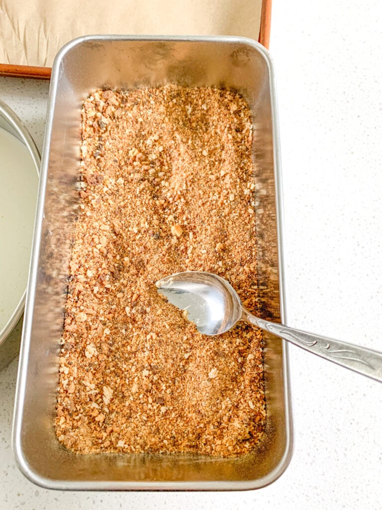 stirring breadcrumbs mixture together