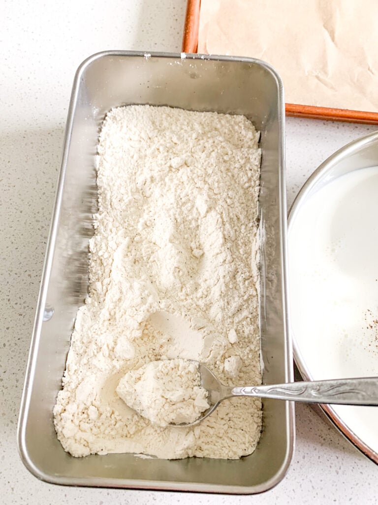 mixing flour mixture for dredging