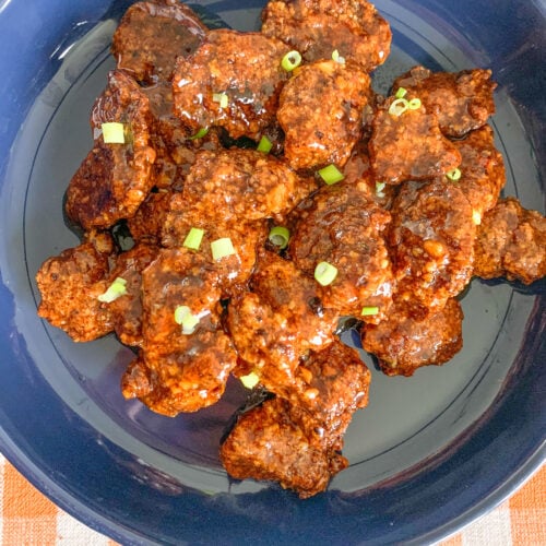 freshly cooked and coated baked orange chicken